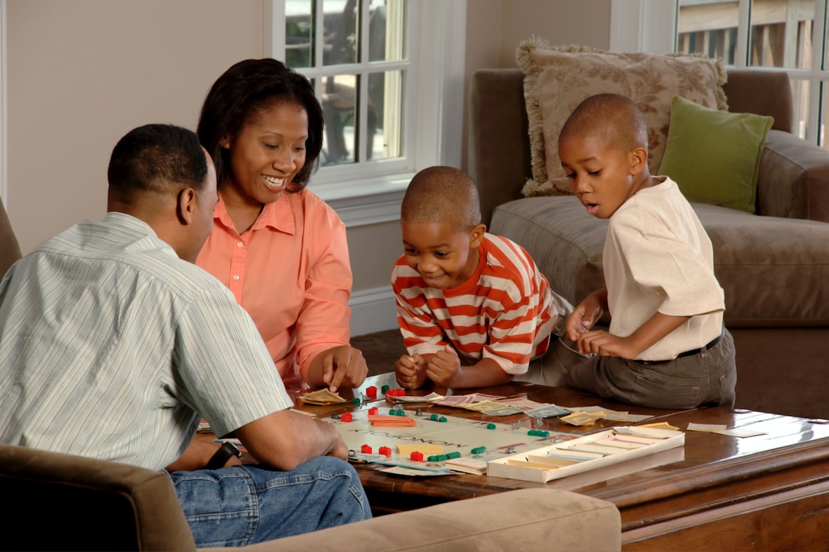 Family playing a spelling game together