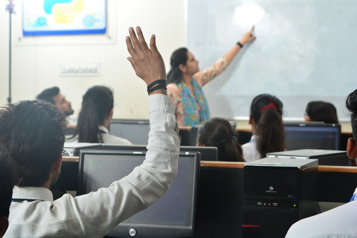 Students using laptops in a classroom